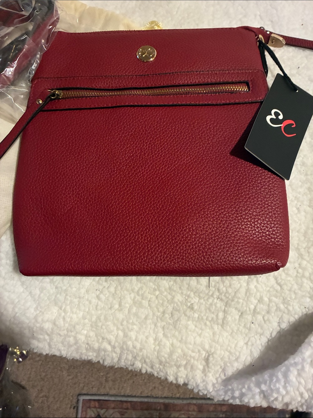 Red Pebbled Crossbody Leather Bag with Gold Zip Accent